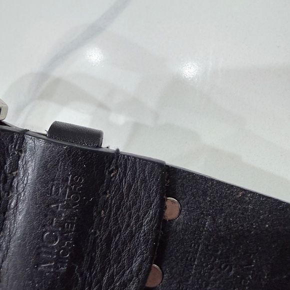 Michael Kors leather grommet belt with silver-tone buckle + MK hardware plaque